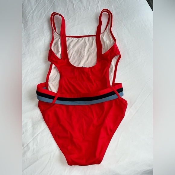 Solid and striped bathing suit, size medium. Never worn - Picture 2 of 2